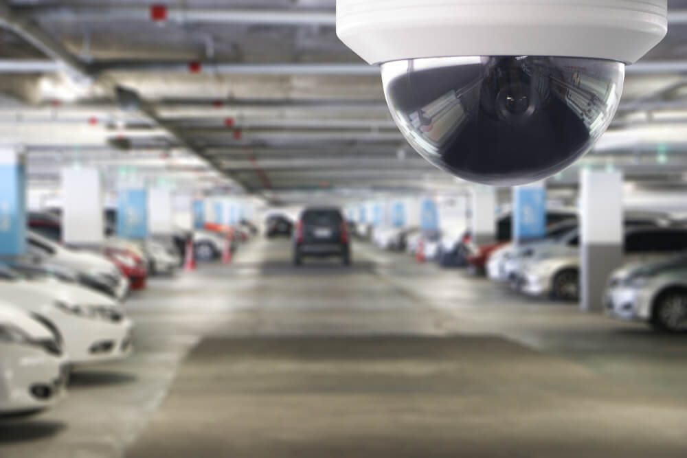 Photo of a security camera in a car park